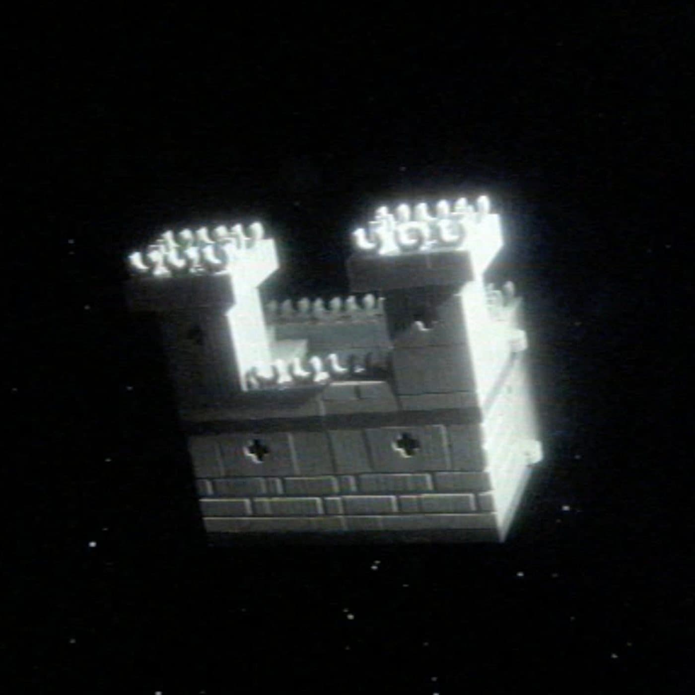 Foreverer cover: a small white Lego castle in the dark
